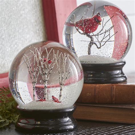 Raz imports snow globes - About this item . Raz Imports makes it easy to decorate for Christmas with this beautiful water globe with continuous swirling glitter ; Features a delicious gingerbread town scene with lighted windows details; The round ball globe sits on a tall base decorated to look like a sparkling gingerbread cake with intricate icing trim and pattern and adorned …